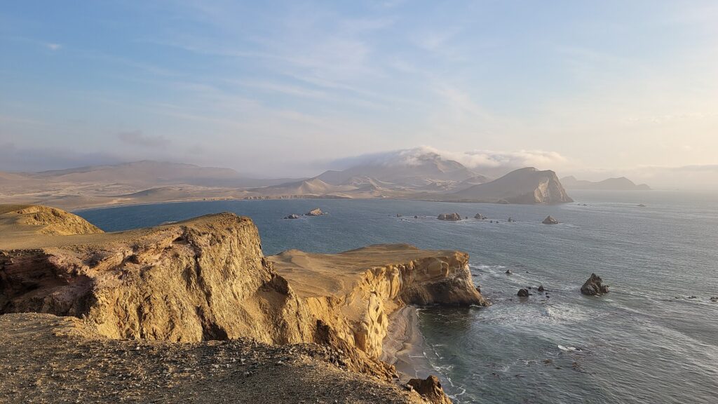 Desert cliffs meeting the Pacific Ocean at Paracas National Reserve