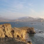 Desert cliffs meeting the Pacific Ocean at Paracas National Reserve