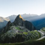 Machu Picchu citadel at sunrise with Huayna Picchu and Andean terraces, Peru